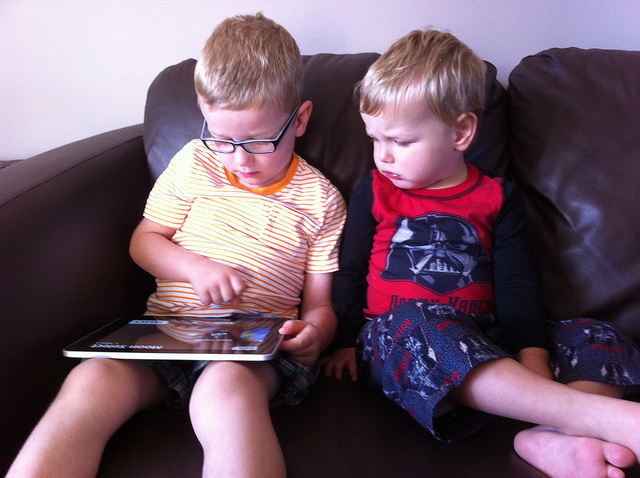 Kids playing with Ipad